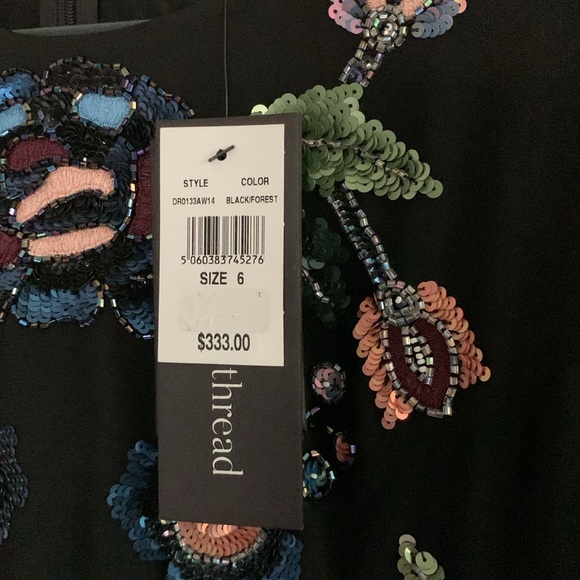 Long sleeved mini needle and thread black dress - Picture 3 of 3